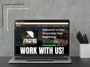 Image of a laptop displaying RYANRIPE's website's homepage, with the "Work with Us" text