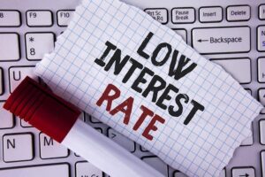 Image of a piece of paper with the words 'Low Interest Rate' written on it.